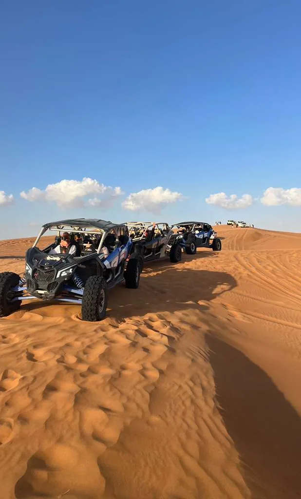 Can-Am Maverick X3 Turbo RR four-seater leading a buggy convoy