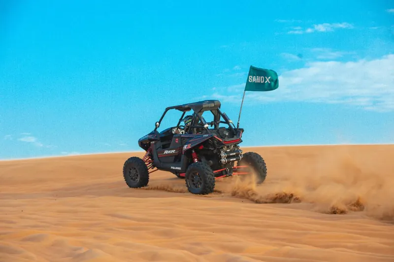 Polaris RZR RS1 sliding through soft sand